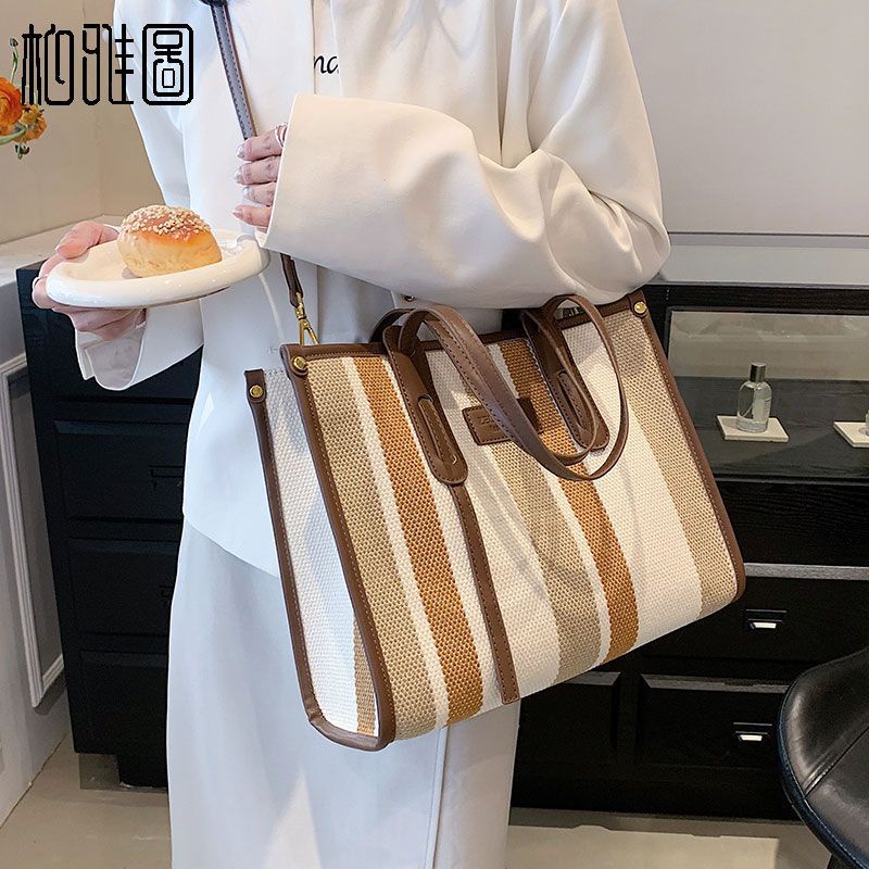 Sera Parker tas Jepang dan Korea Selatan tekstur Messenger tas berkapasitas besar siswa kelas Komuter fashion portable tote bag