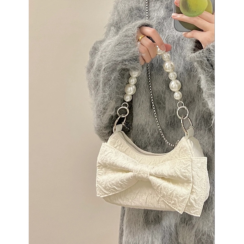 Red 2022 ceruk baru mutiara rantai tangan ketiak tas lipit hot gadis busur satu bahu Messenger tas Baguette tas