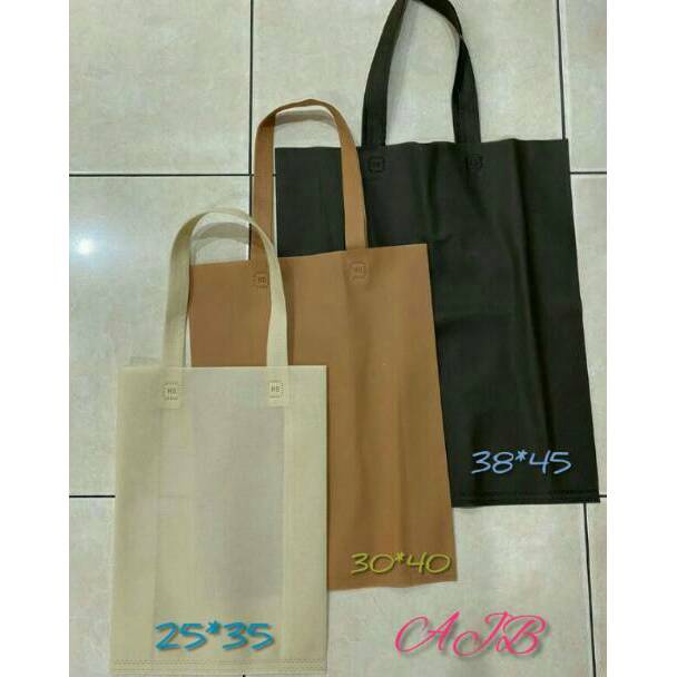 

12.12 HARGA GROSIR (Lusinan= 12 pcs) goodie bag 38x45x10 - tas kain - spundbond (12 pcs)