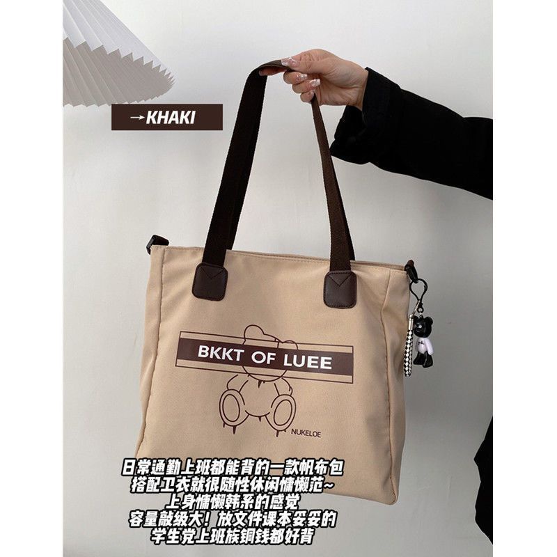 ☫Sera  baru tas kanvas siswa perempuan kapasitas besar tas komuter kelas satu bahu Messenger portable kasual all-match tote bag