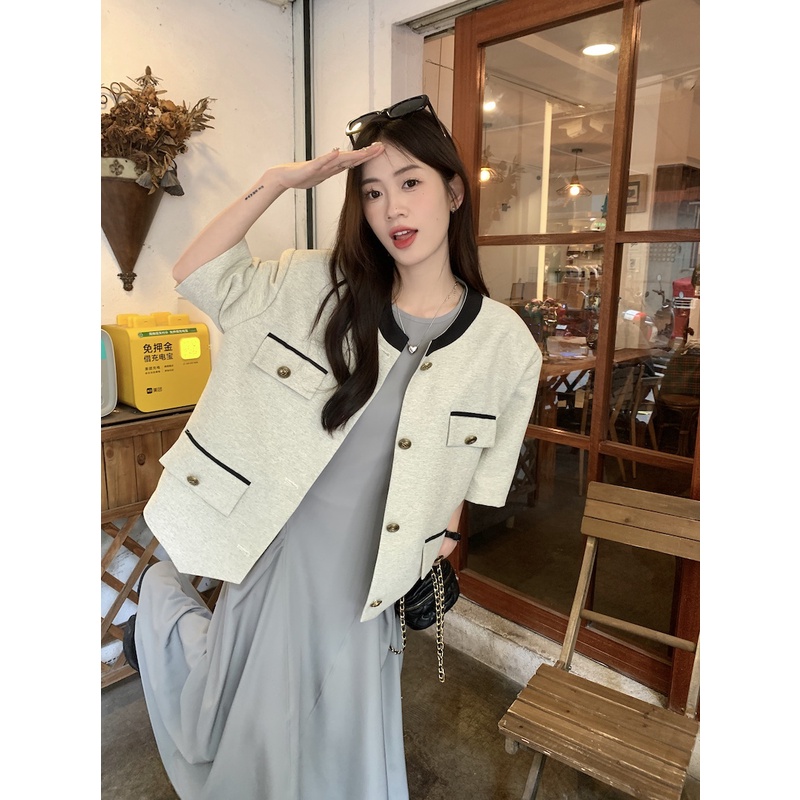 ✁♨☸gaun pantai musim panas gaya Prancis wewangian kecil bagian tipis jaket lengan pendek wanita musim panas fashion desain akal ceruk longgar temperamen cardigan top