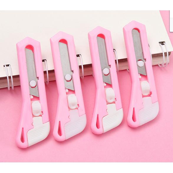

Cutter Mini Pink Pemotong Kertas Saku