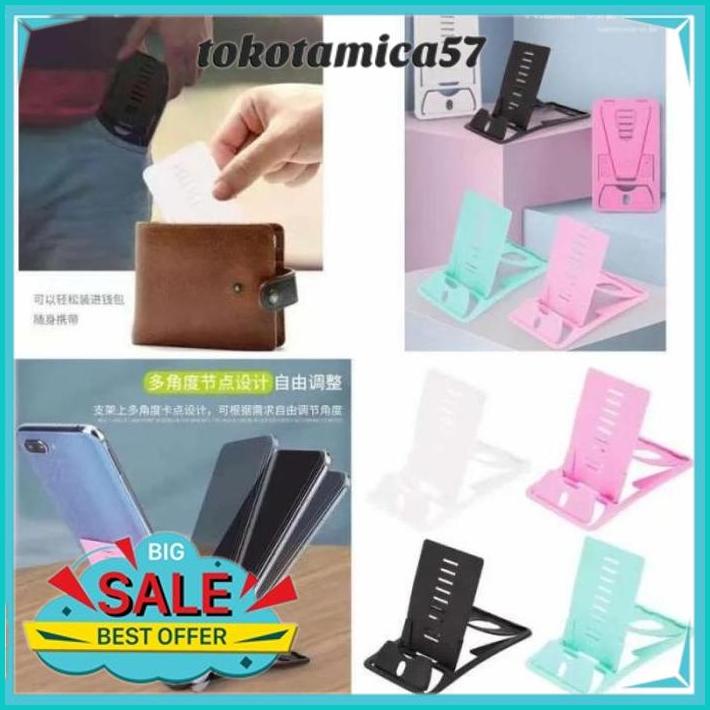 

DUDUKAN DOCKING STAND PHONE HOLDER LIPAT TIPIS SLIM CARD KARTU ATM HP BEBAS ONGKIR