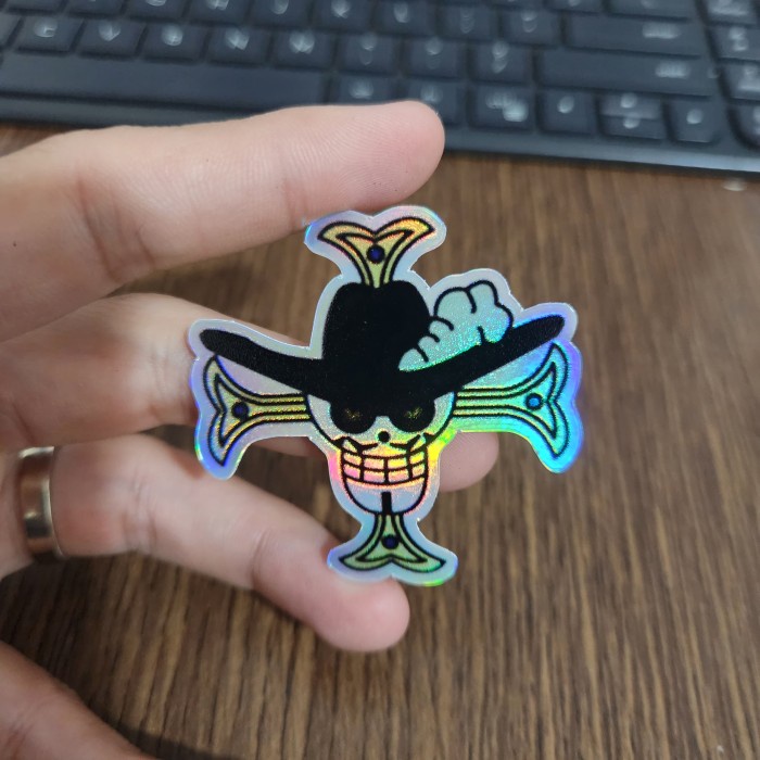 

Sticker Hologram Anime - PSH1801 - One Piece - Logo Mihawk