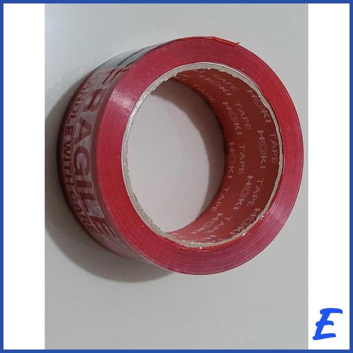 

PJM - LAKBAN FRAGILE MERAH PUTIH MERK HOKI 48MM X 100 YARD 2 IN 1