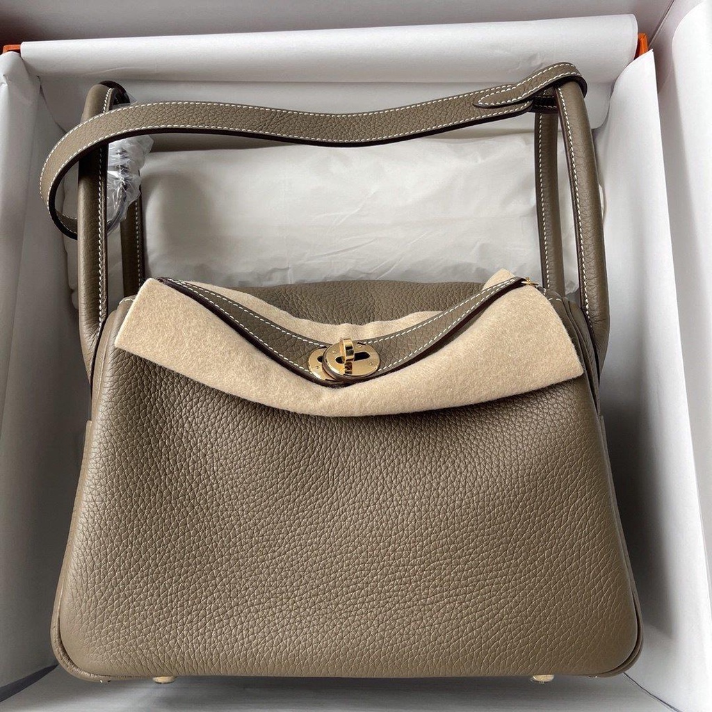 Togo Herme_ Lindy 26 top-handle handbag holiday traveling tote with protective feet