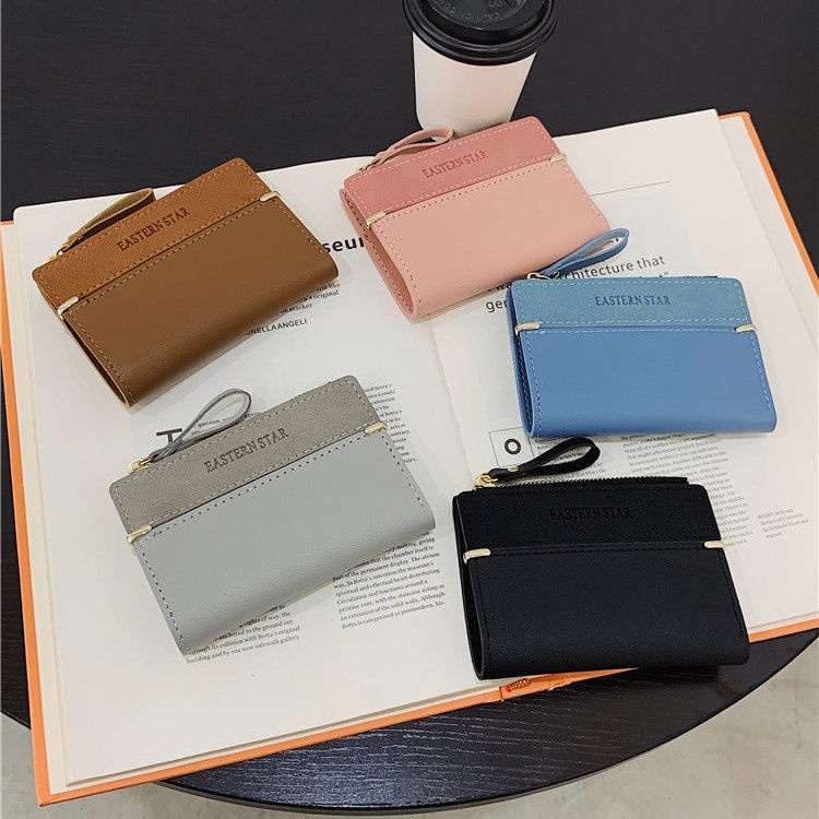 Sera ins short wallet female short section 2022 new Korean version simple small fresh folding zipper buckle coin clip