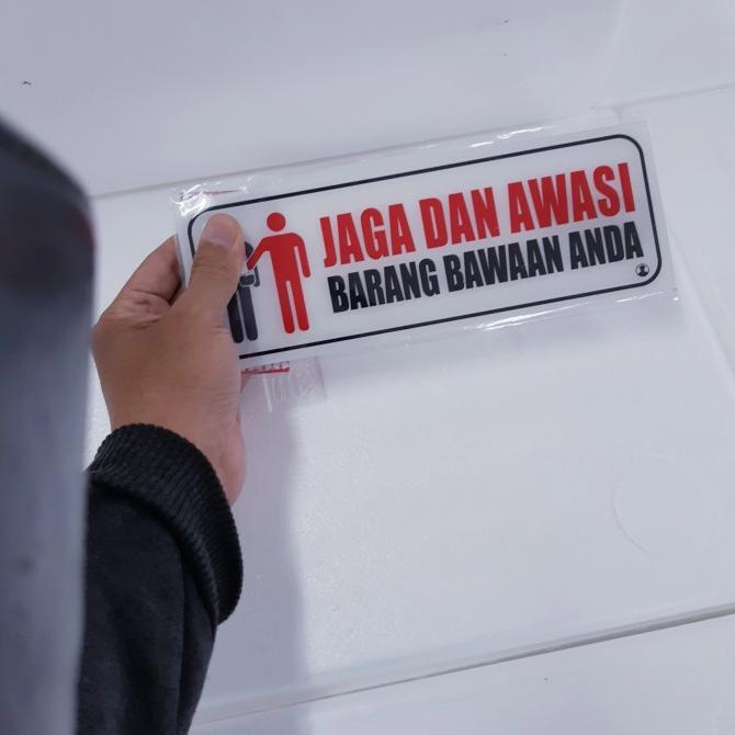 

^^^^^] Papan arklilik Tulisan Jaga dan Awasi Barang Bawaan Anda