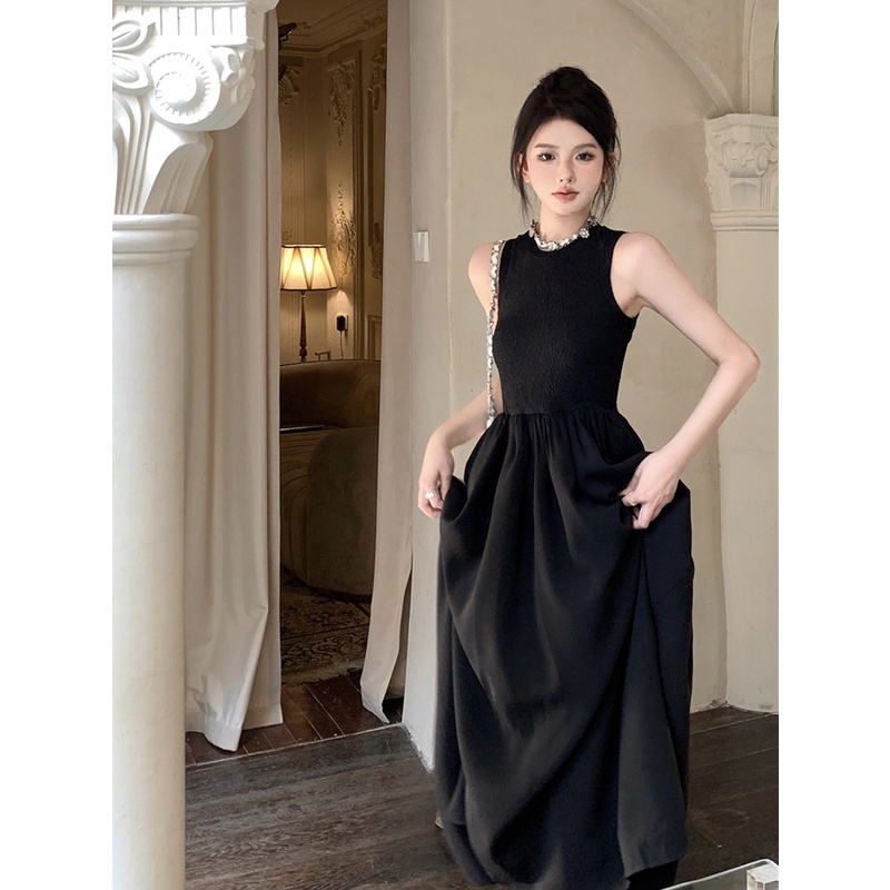 ❀┇gaun musim panas pantai hitam tanpa lengan Perancis retro temperamen Hepburn gaun wanita musim panas rasa desain rompi ceruk backless rok panjang