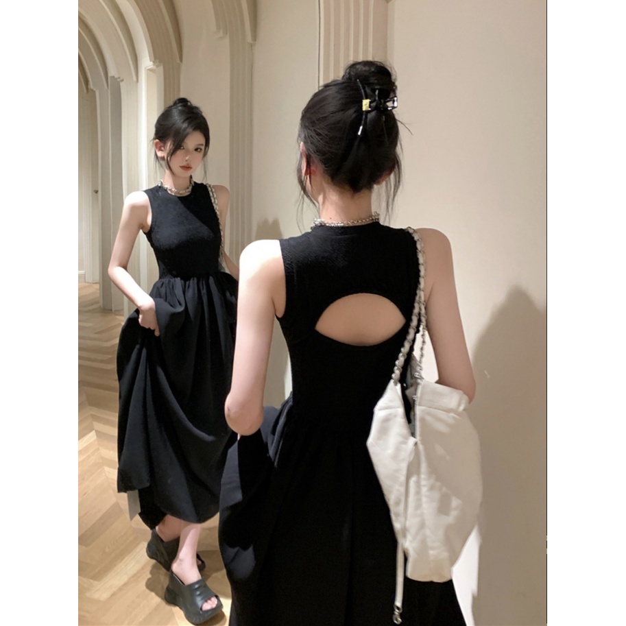 ❀┇gaun musim panas pantai hitam tanpa lengan Perancis retro temperamen Hepburn gaun wanita musim panas rasa desain rompi ceruk backless rok panjang