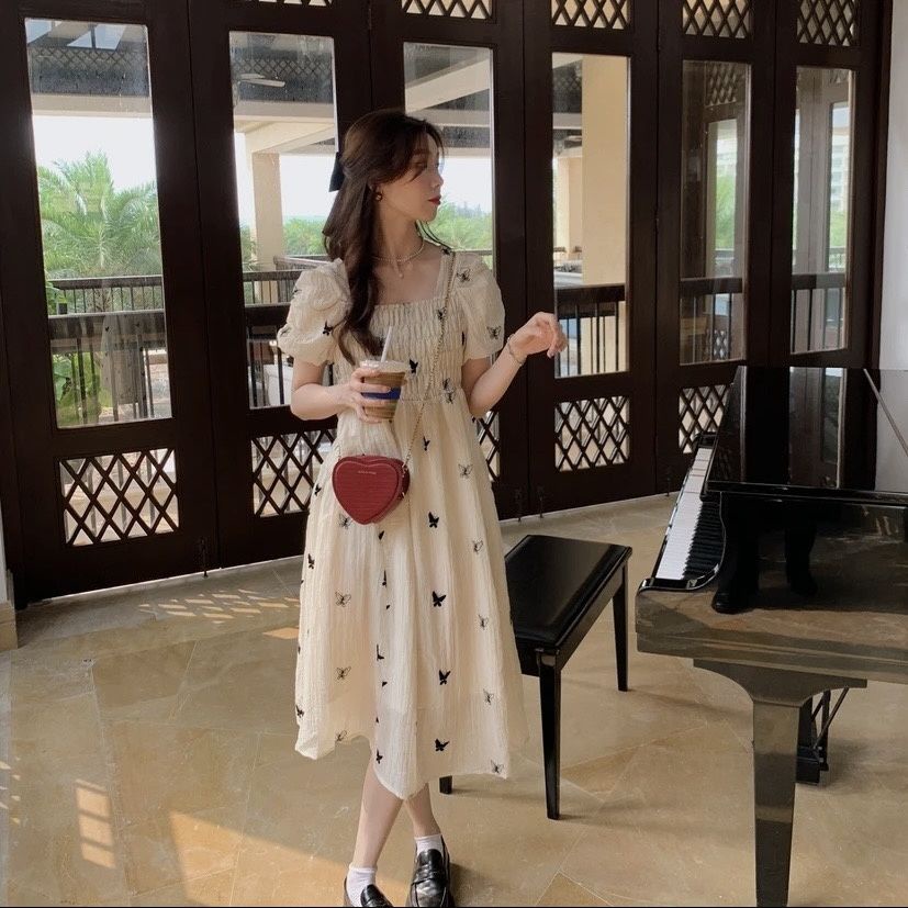 Red Gaya Prancis lengan engah lembut gaun kupu-kupu baru musim panas produk baru kerah persegi ramping rok bunga berlipit rok peri