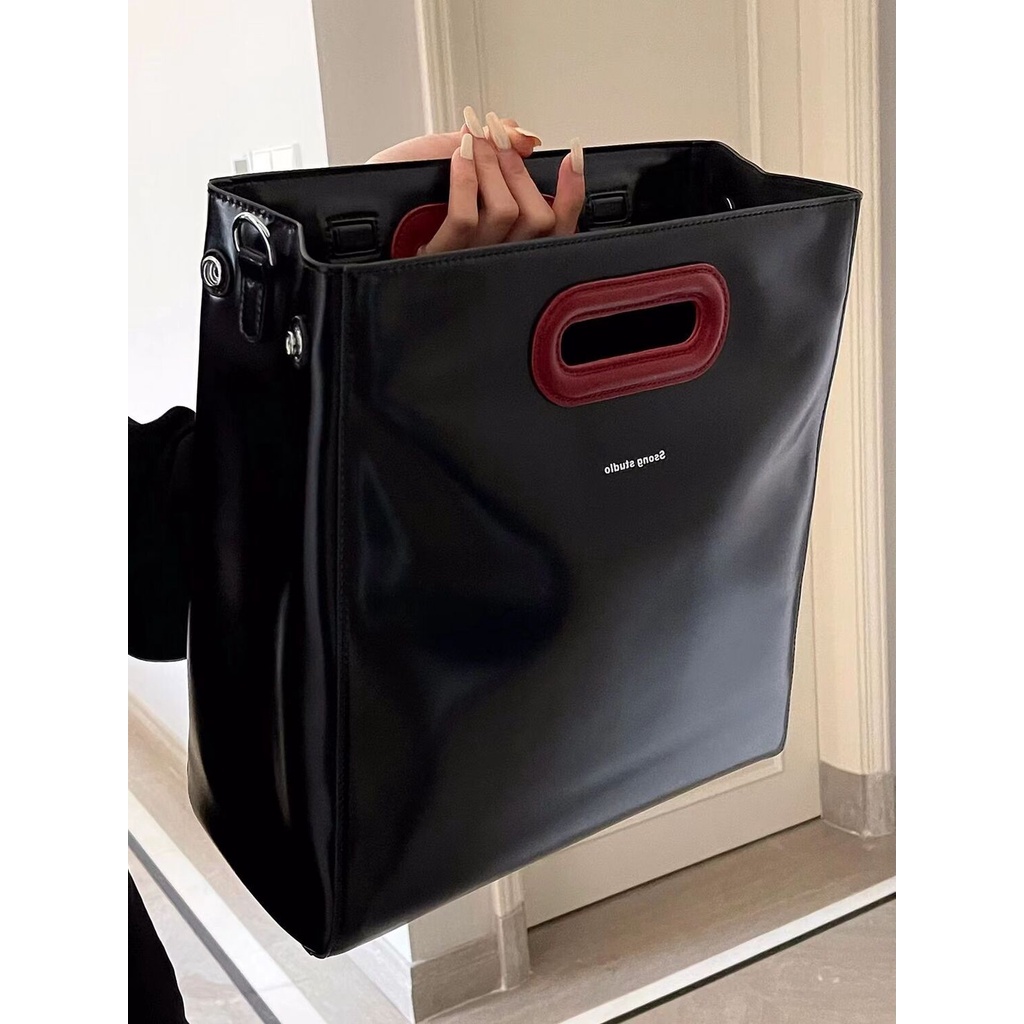 Sera niche design all-match commuter high-end tote bag 2023 tas fashion wanita simple kapasitas besar portable square bag