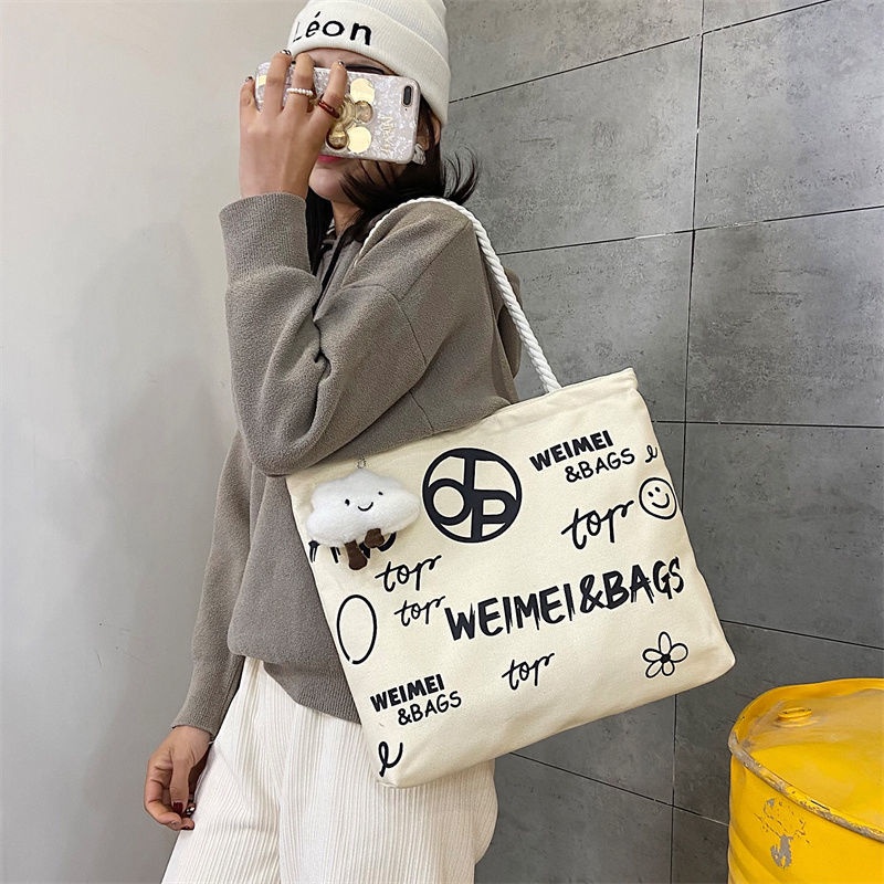 Sera high-end commuter tas besar 2023 baru all-match tote bag tas bahu besar kapasitas besar tas wanita tas kanvas