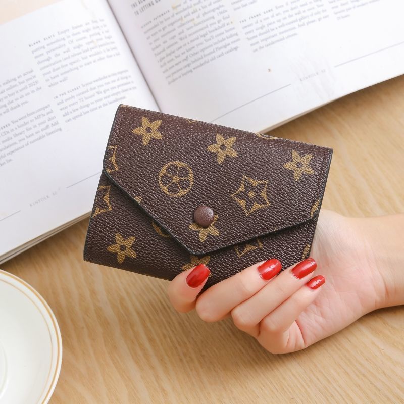 Sera Eropa dan Amerika dompet kecil sederhana wanita pendek ultra-tipis pemegang kartu retro fashion trendi dompet wanita ultra-tipis dompet dompet