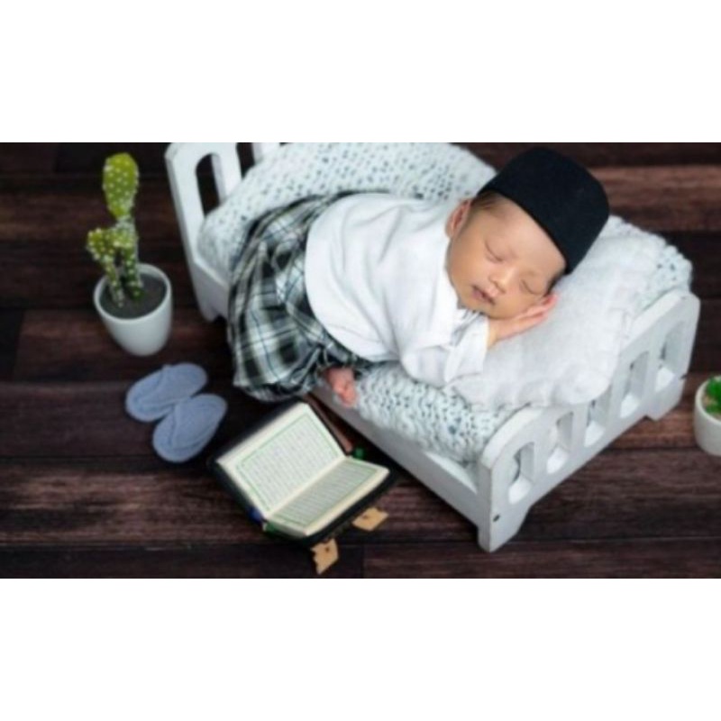 songkok bayi baru lahir