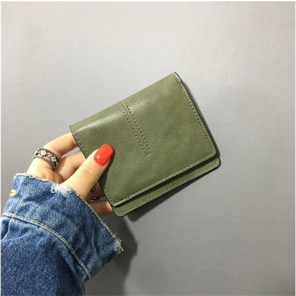 Sera pendek dompet kecil wanita bagian pendek 20% off baru ins Eropa dan Amerika sederhana ultra-tipis all-match gesper warna solid tas kartu kepribadian