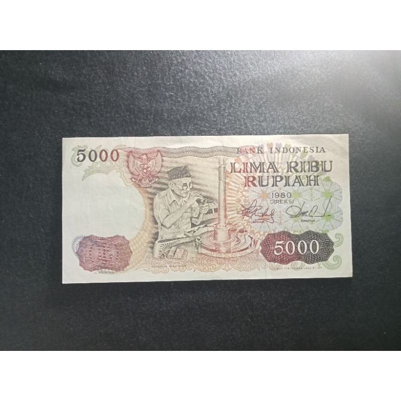 5000 rupiah rumah adat Toraja asah intan WNH 088844 UNC baru/gress