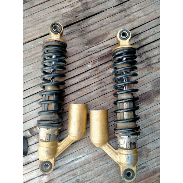 shock belakang tiger revo original