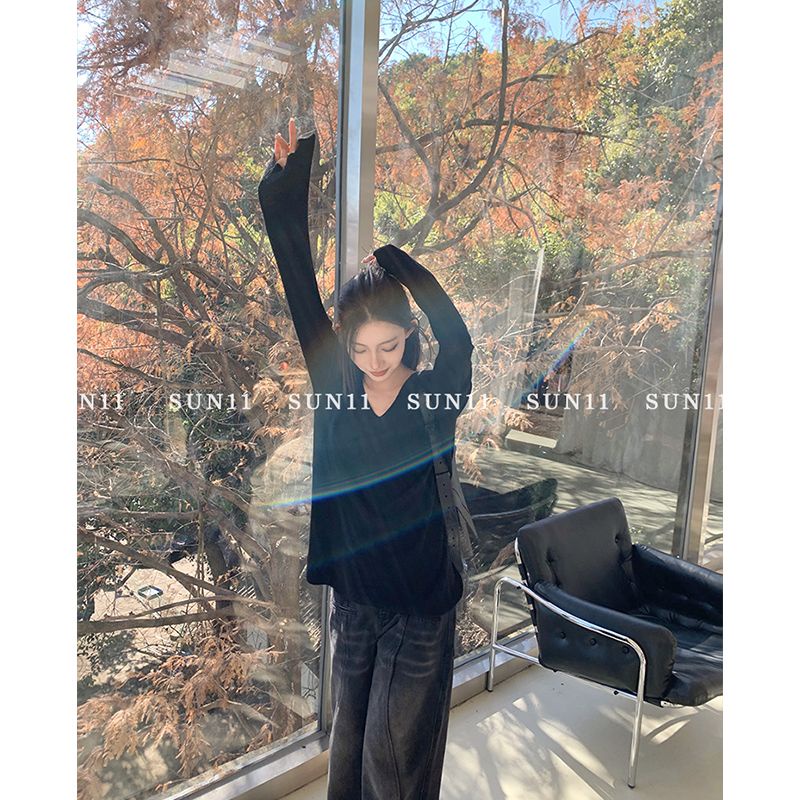 Red Keinginan murni angin V-neck lengan panjang top wanita musim semi dan musim panas baru putih mikro-transparan rasa desain ceruk longgar rajutan tabir surya kemeja