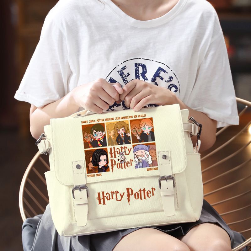 ❧Sera  Harry Potter co-branded sekitarnya sekolah sihir lucu kartun siswa kanvas tas bahu portabel tas Messenger