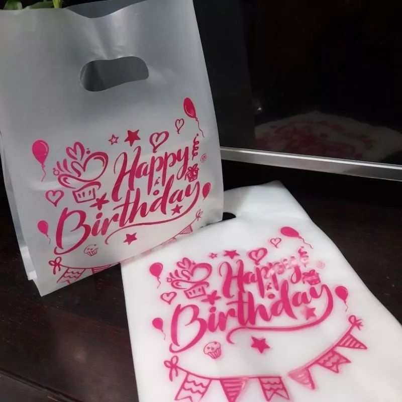 

(isi 10) plastik happybirthday motif /plastik HD 0.45 mic./mika bento buram transparan /kantong plastik hidangan