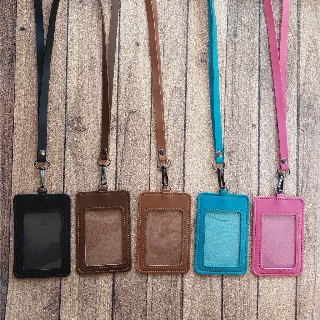 

NAME TAG ID CARD KULIT HOLDER LANYARD MUAT 2 SLOT KARTU TERMURAH BERKUALITAS NTS035