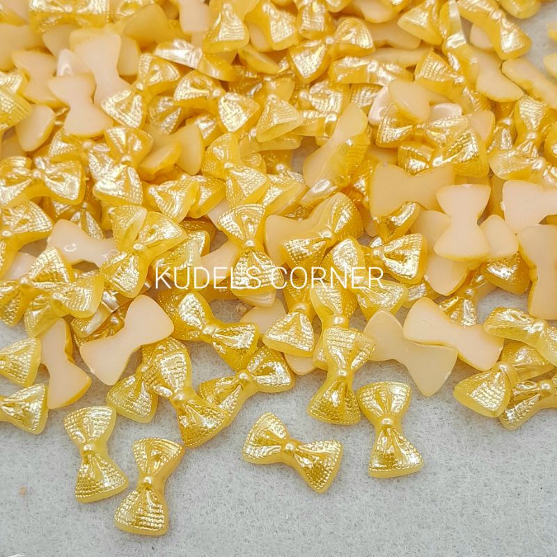 20pcs mutbel pita/ mutiara belah pita/mote tempel pita