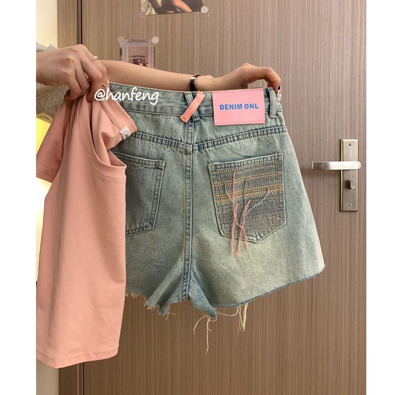 Red Versi Korea chic elastis retro tepi mentah lubang terlihat tipis pinggang tinggi kata hot pants jeans 2023 musim panas baru ins