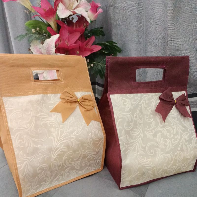 

tas hajatan embos bambu kombinasi 22 ketebalan 75 GSM