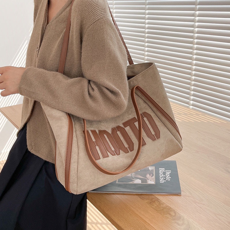 Sera tas berkapasitas besar tas wanita 2023 baru high-end ceruk satu bahu tas besar mahasiswa bepergian tas jinjing