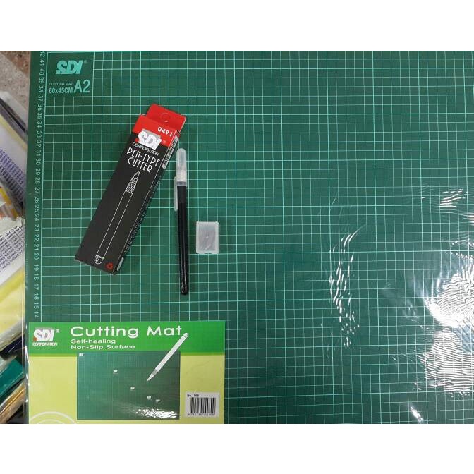 

Terlaris Vbn Paket Cutting Mat Sdi A2 + Pen Cutter + Refill
