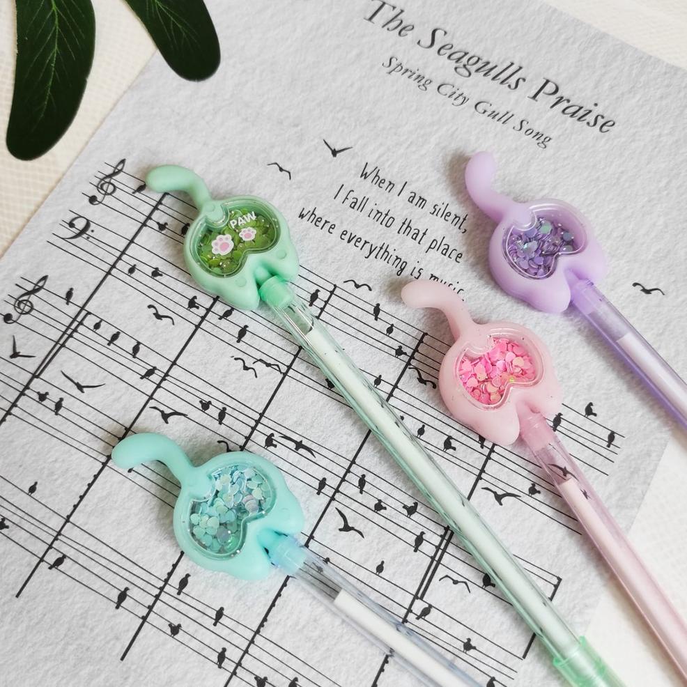 

Trending Selusin Pulpen Ekor Kucing Isi 12 Pcs Hiasan Glitter Pen Cat Pena Gantungan Manik Gel Karakter