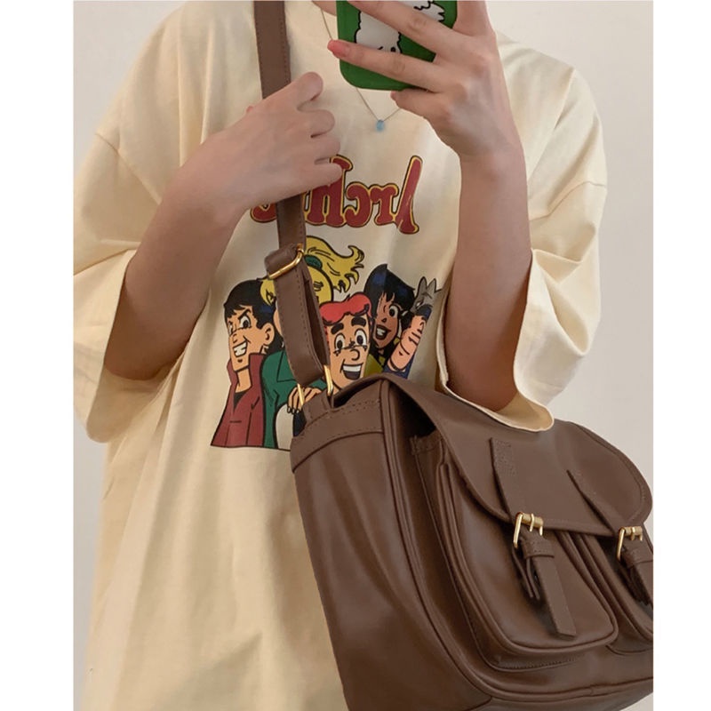 ▤❈♞Sera  Toko Retro Kapasitas Besar Messenger Tas Wanita 2023 Baru All-Match Single Tas Bahu Desain Niche Commuter Messenger tas