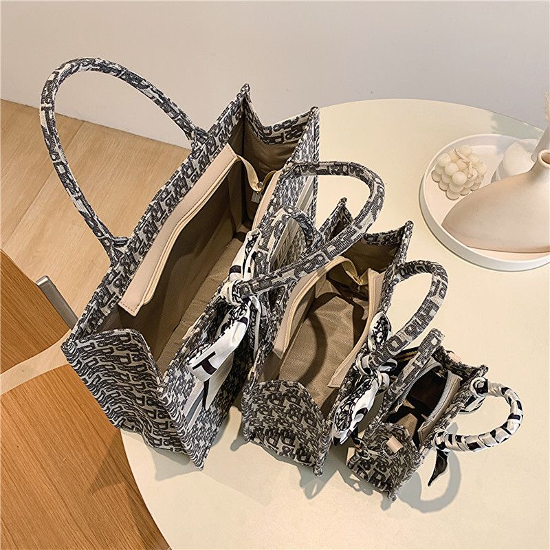 Sera tas besar wanita 2023 baru tas belanja komuter portabel all-match kapasitas besar bahu ketiak tas kanvas tote bag