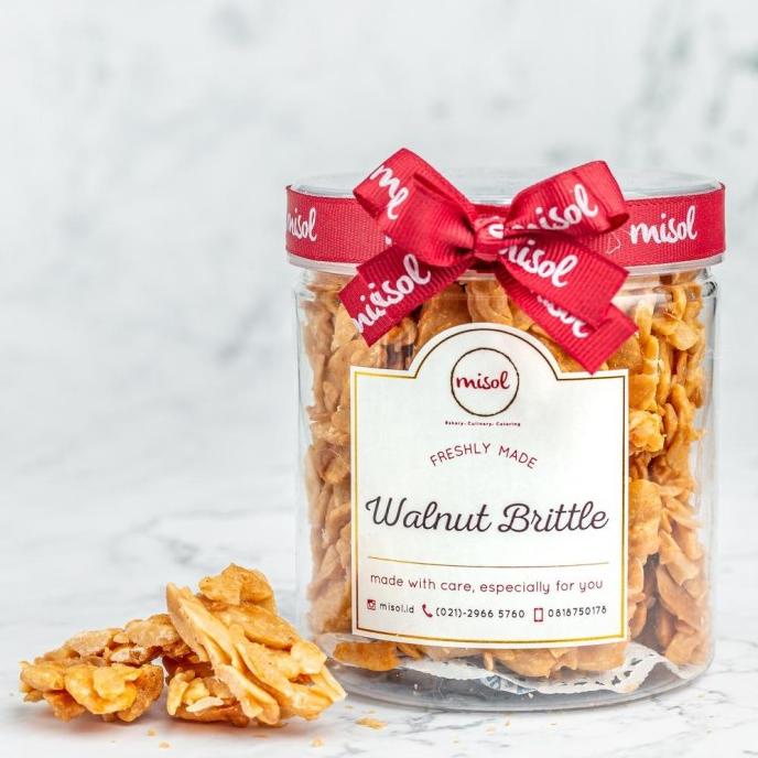 

KUE KERING WALNUT BRITTLE KUE KERING MISOL NETTO 164 GR KEMASAN TOPLES BULAT EL09I09A82L