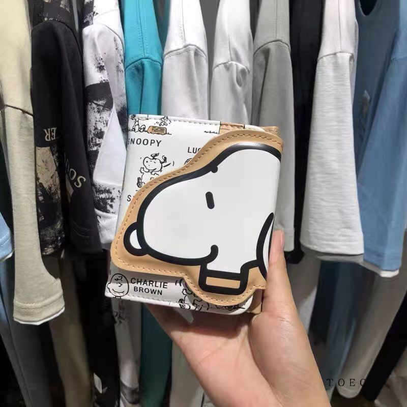 Dompet Sera Snoopy hadiah ulang tahun wanita 2021 baru asli dalam dompet pendek wanita siswa kartun Jepang dan Korea