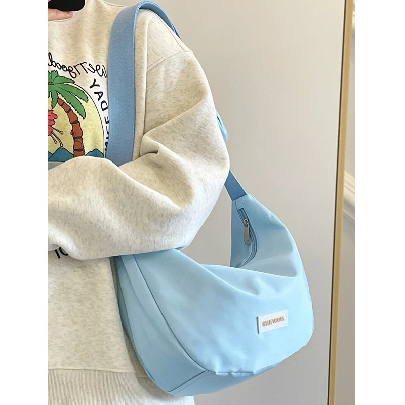 Red Messenger tas kanvas wanita 2022 baru mahasiswa kelas tas kain nilon kapasitas besar pangsit tas satu bahu tas jinjing