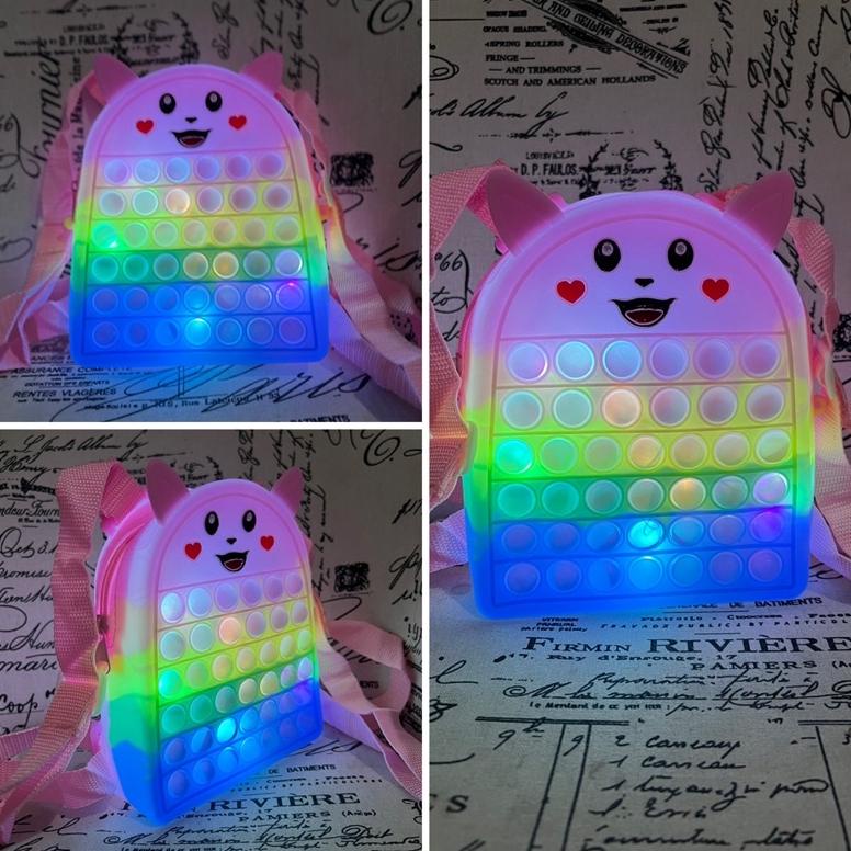 New Tas pop it Ransel tas ransel anak anak pop it lampu .,