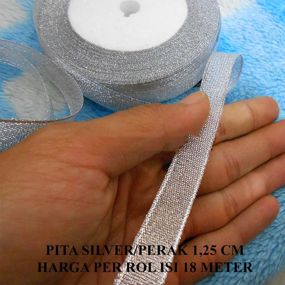 

Pita Warna Silver/Perak Lebar 1,25 cm Murah Harga Per Rol isi 18 meter