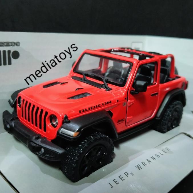 diecast kinsmart jeep wrangler rubicon . merah