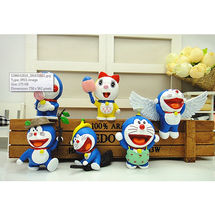 

DORAEMON SAYAP TERBANG ISI 6 FIGURIN / TOPPER KUD qab03