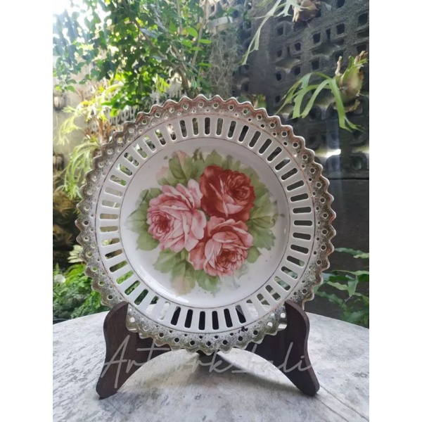 piring keramik kerawang bunga mawar