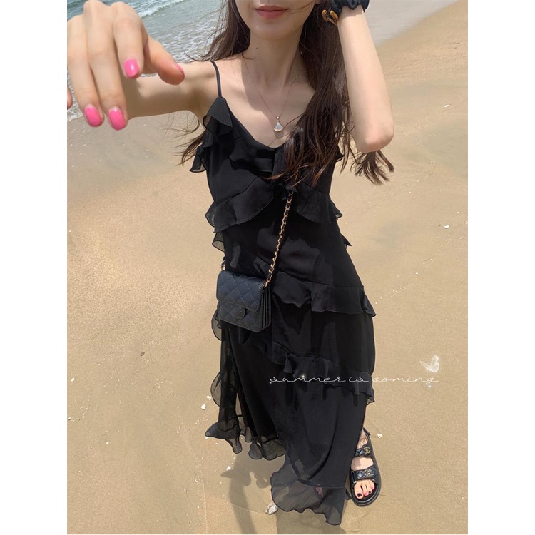 Red Ruffled black suspender dress wanita musim panas baru French high-end sense of thin seaside holiday long skirt skirt