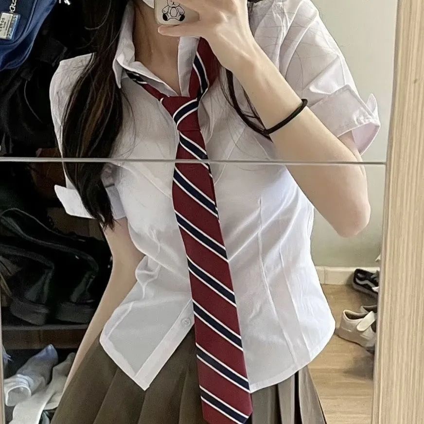 Red Gaya kuliah Gaya Korea mengenakan atasan kemeja ramping pinggang wanita musim semi dan musim gugur rok lipit rok pendek setelan jas dua potong trendi