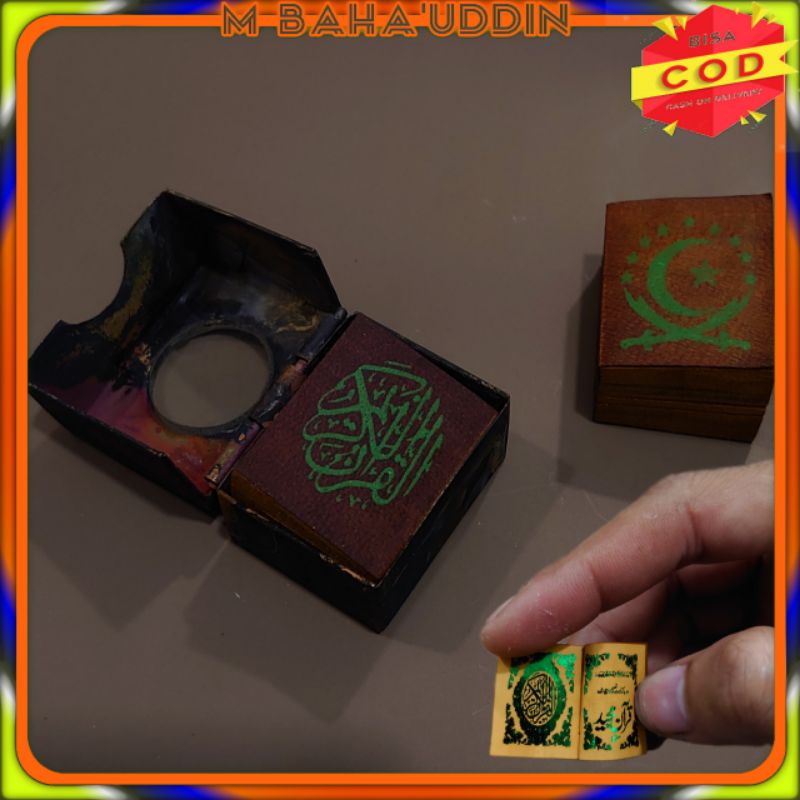 Al Qur'an stambul tinta hijau wadah kuningan ada kaca pembesar
