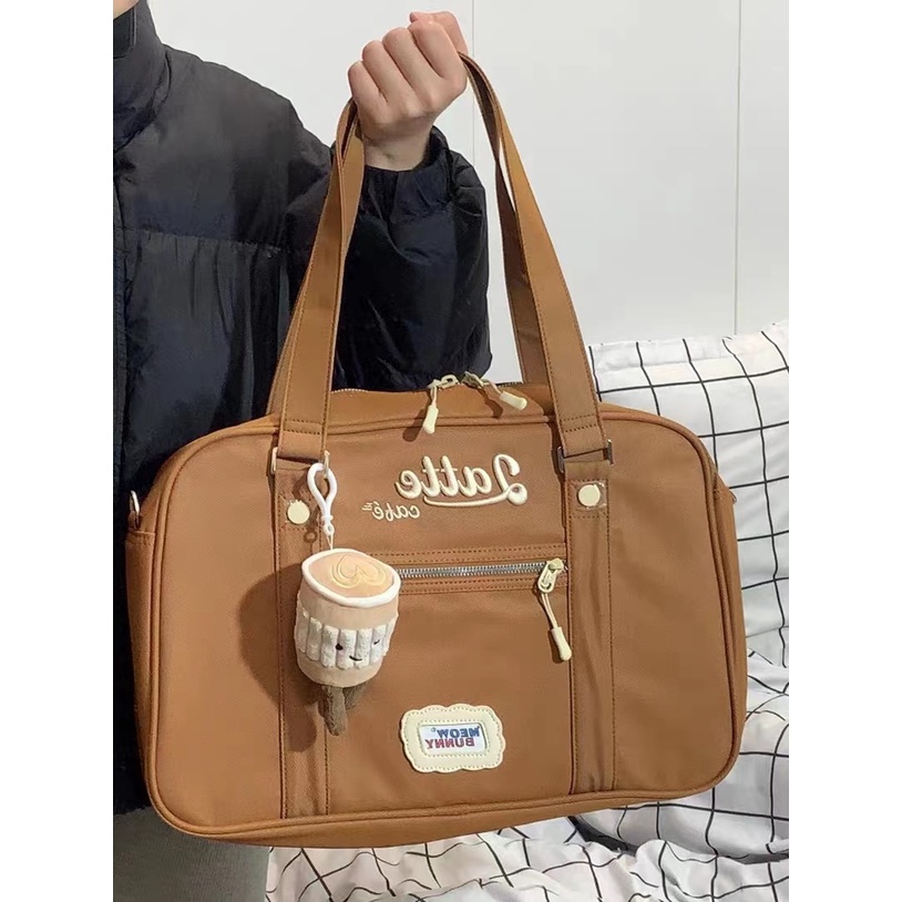 Sera American retro tas bahu baru mahasiswa kelas komuter tas Messenger penggunaan ganda kasual nilon tote tas wanita