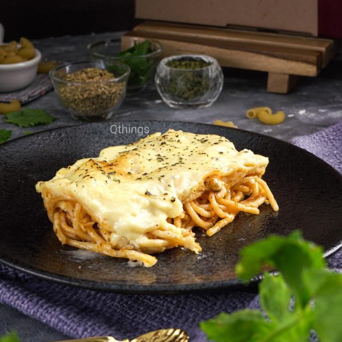 

Promo baked spaghetty brulee large with melted cheese