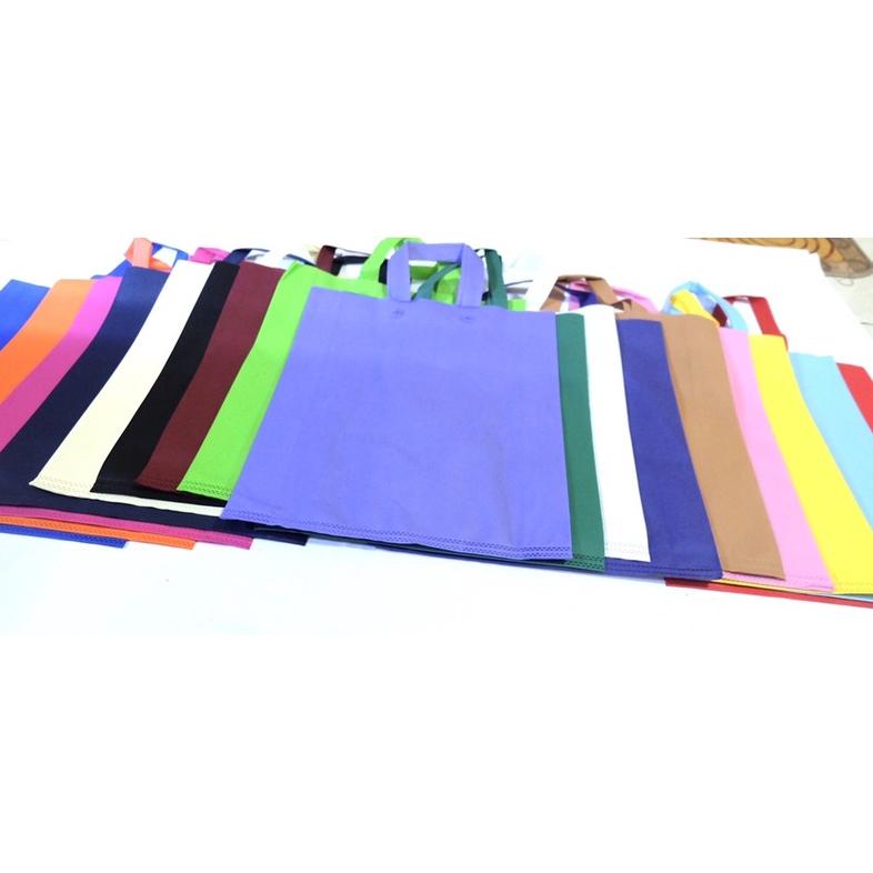 

Trending Tas Kain Souvenir Bahan Spunbound Tenteng Warna Warni Jumbo Size 38X 45 Isi 12