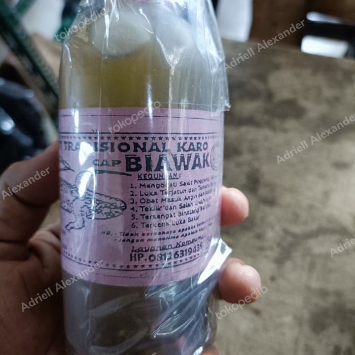 Minyak Urut Tradisional Karo Cap Biawak