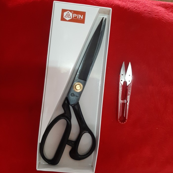 

GUNTING POTONG BAHAN KAIN PIN 10